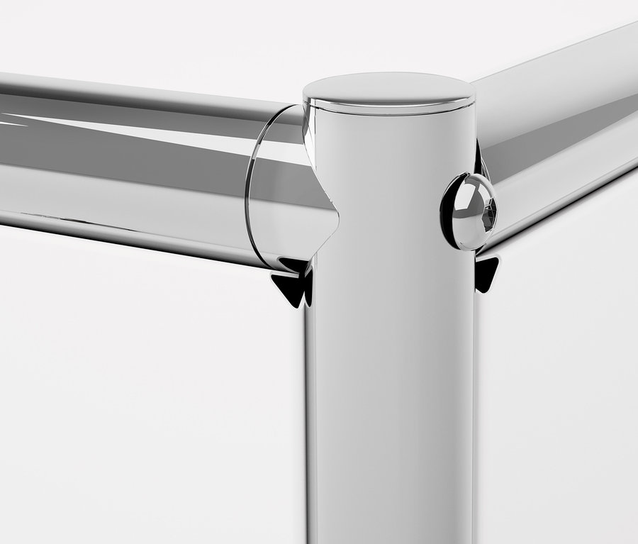 Detail rohu bílého kovového regálu CN3 s trubkovou konstrukcí.