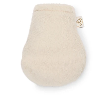Mini termofor leží na bílém pozadí.