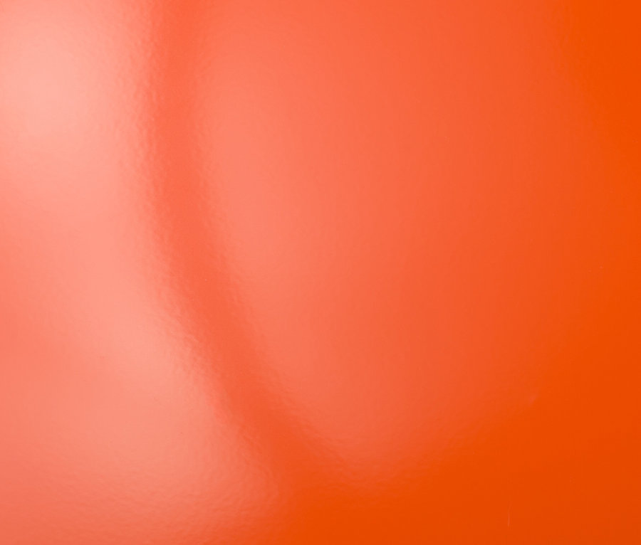 Oranžové pozadí s odlesky.