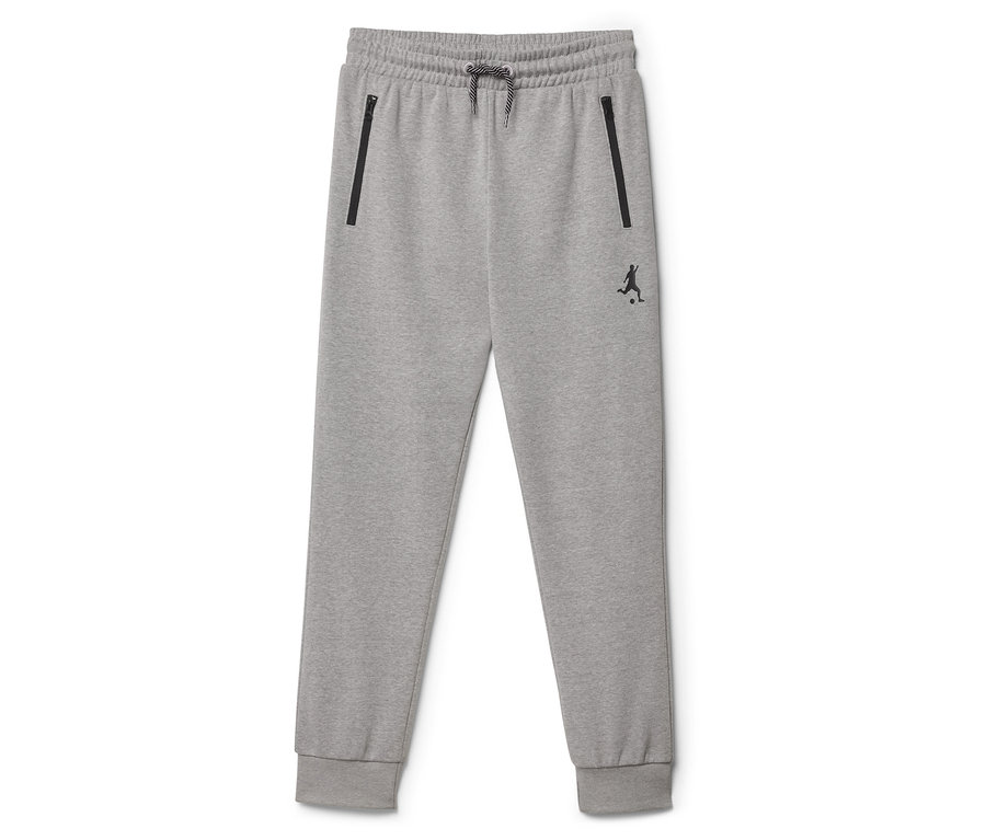 Šedé tepláky se stahovací šňůrkou a kapsami na zip.