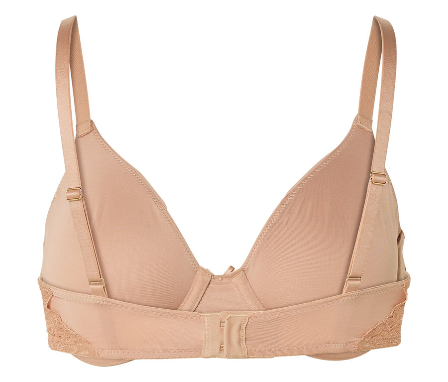 Detailní záběr na zadní stranu béžové podprsenky s nastavitelnými ramínky a krajkovými detaily.