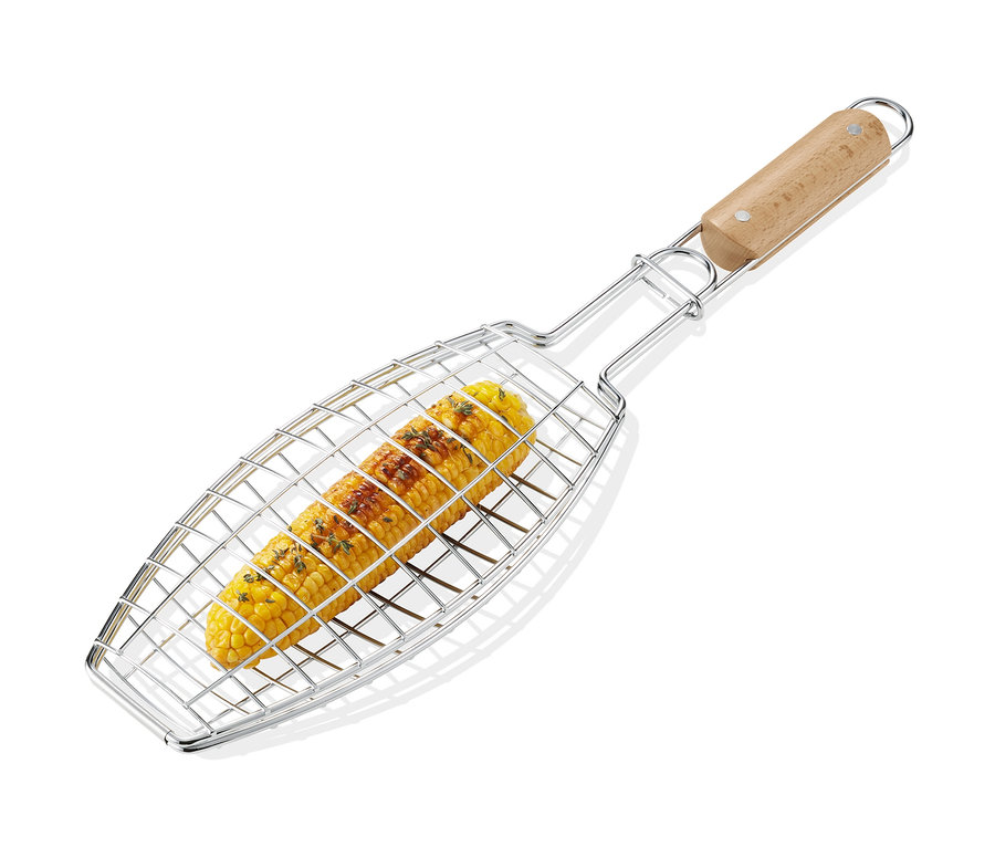 Kukuřice v BBQ obracečce na grilování.