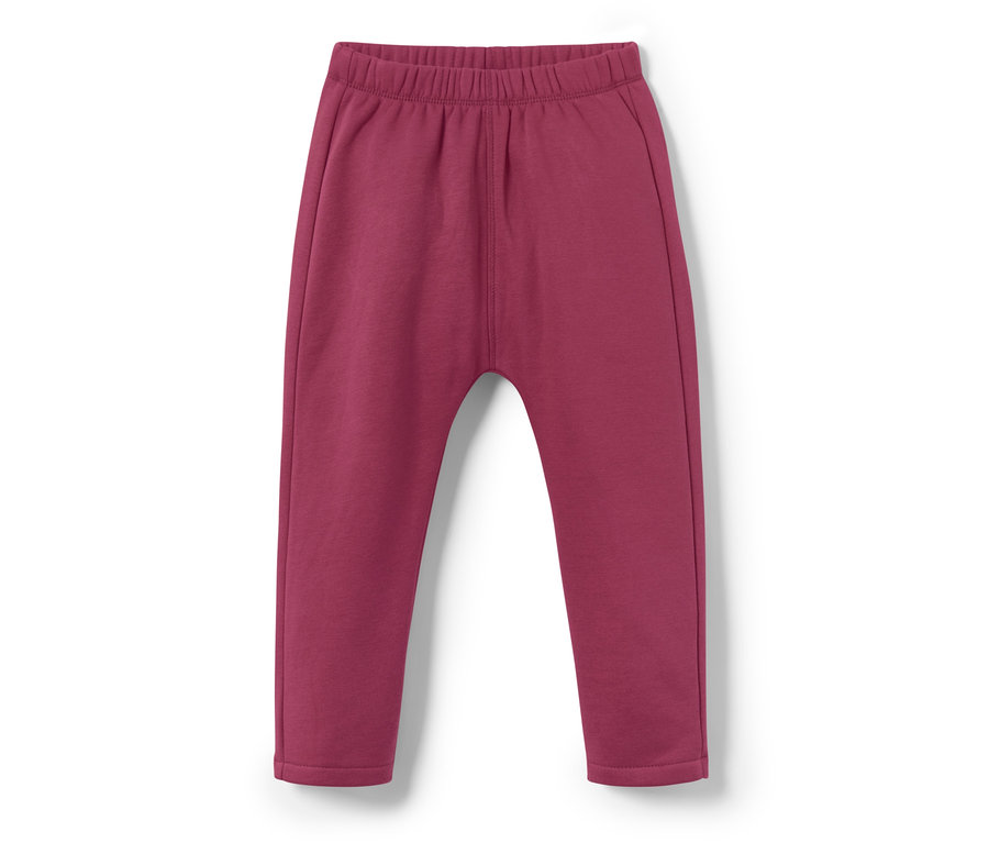 Fialové tepláky pro miminka, duha, na bílém pozadí.