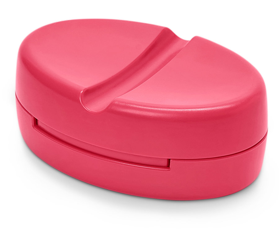 Růžový magnetický držák jehly.