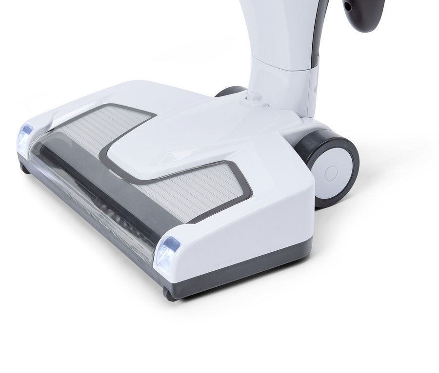 Detailní pohled na bílou hlavici vysavače se šedými akcenty na bílém pozadí.