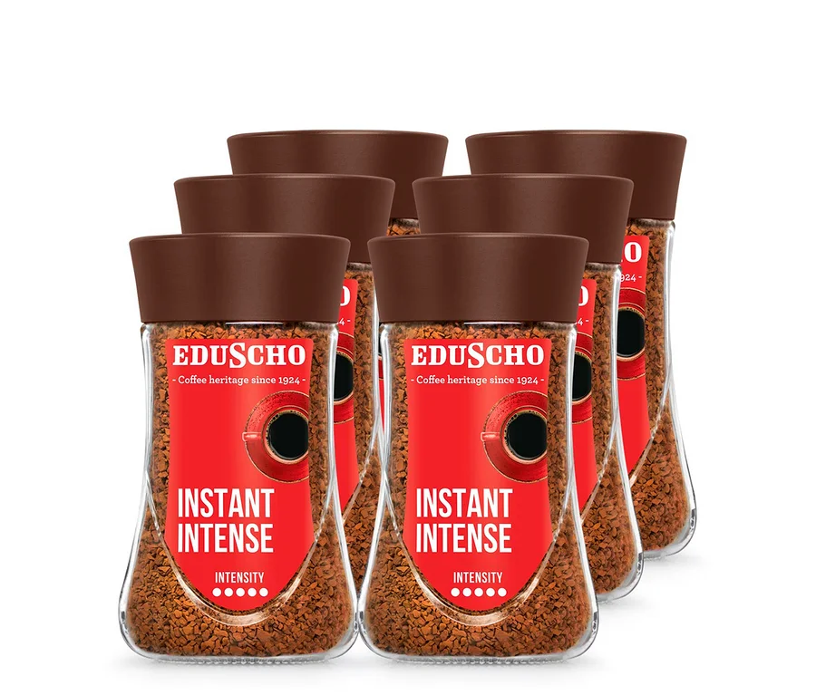 Šest balení instantní kávy EDU Instant Intense 200 g v průhledných sklenicích s hnědým víčkem.