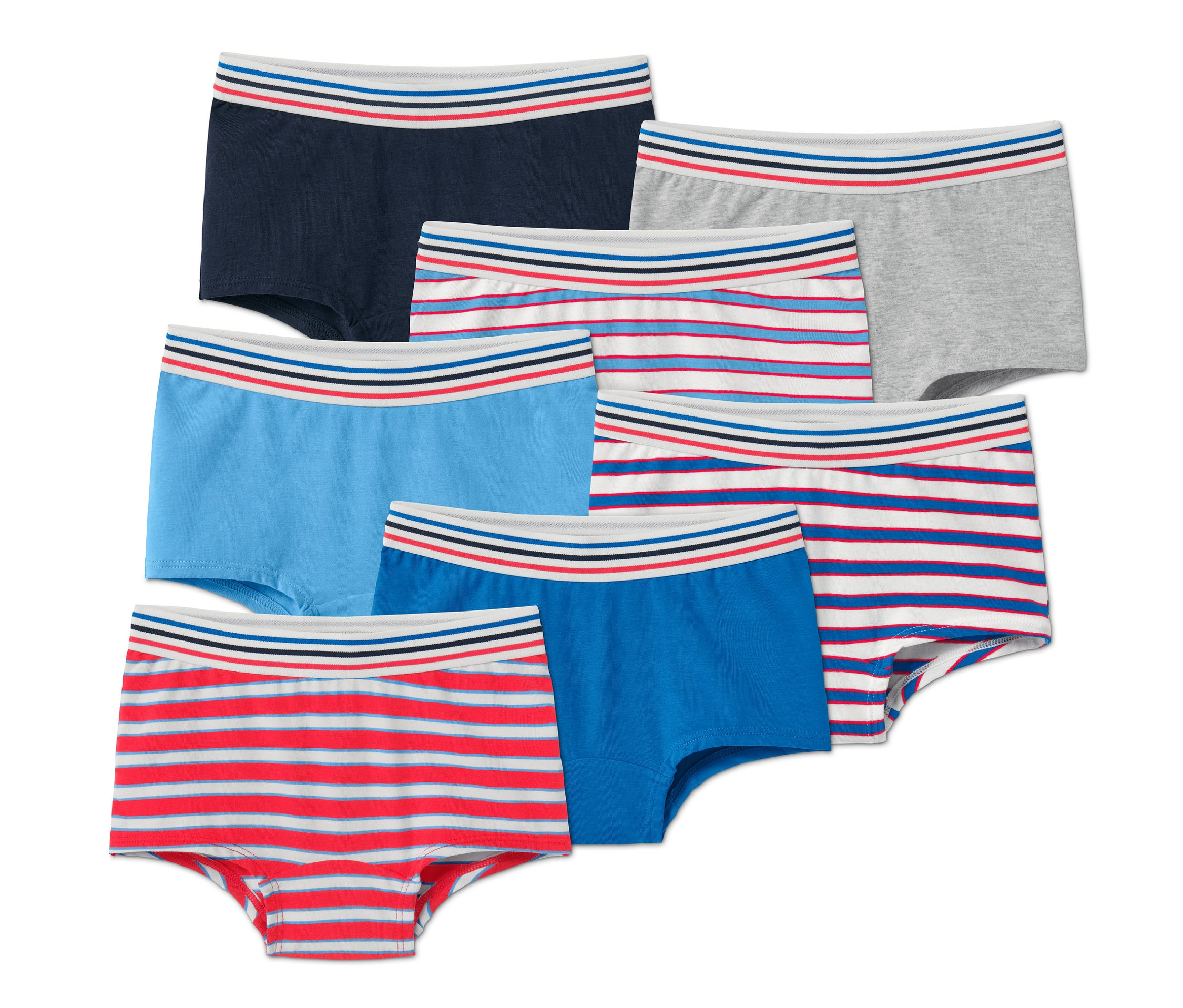 Sedm dívčích kalhotek různých barev.