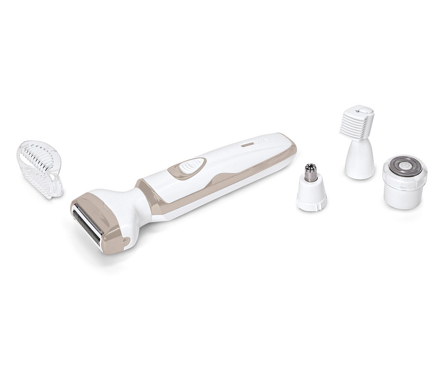 Bílý a béžový zastřihovač chloupků leží s různými nástavci na bílém pozadí.