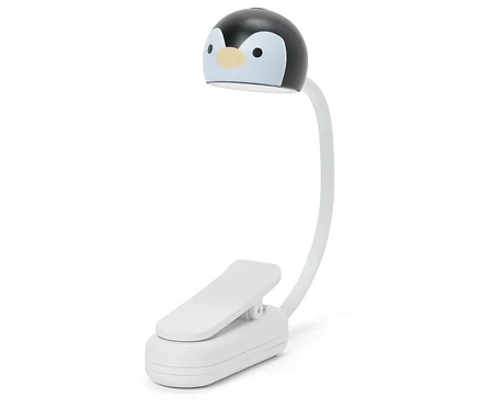 Bílá klipová lampa s flexibilním krkem a černou hlavou ve tvaru tučňáka se světlým obličejem a malýma očima.