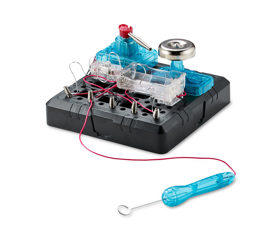 Detail stavebnice Horký drát s modrým držadlem a stříbrným zvonkem.