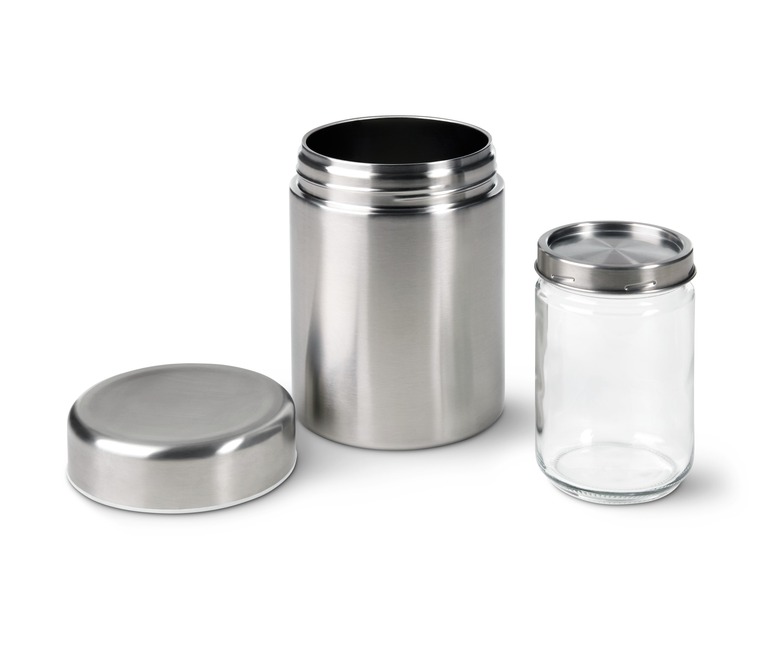 Rozložený jogurtovač se stříbrným vnějším obalem a skleněnou nádobou.