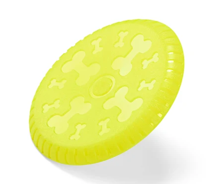 Žlutý létající talíř pro psy s potiskem kostí.