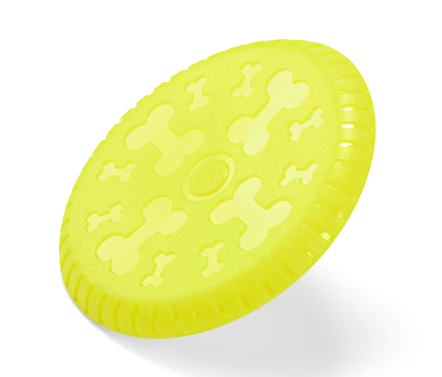 Žlutý létající talíř pro psy s potiskem kostí.