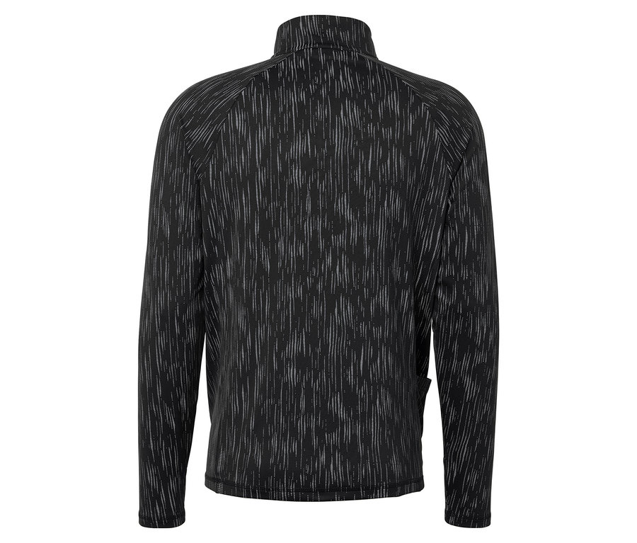 Detail černé bundy se vzorem.