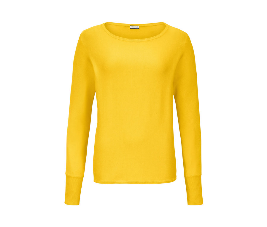 Žlutý svetřík z jemného úpletu.