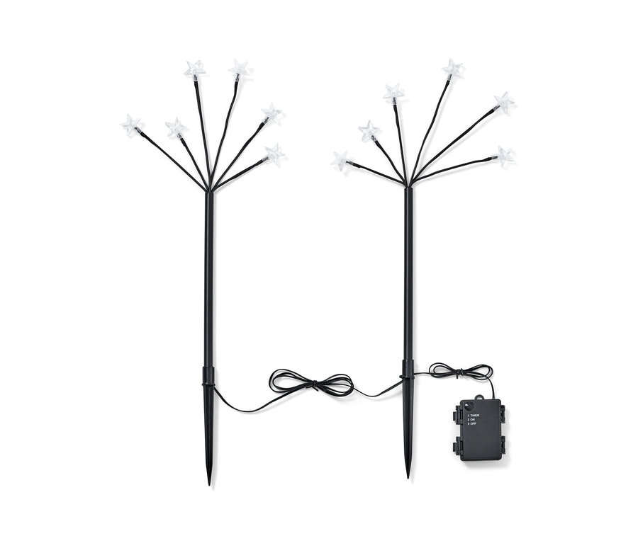 Dva LED bodce k zapíchnutí do země s hvězdami na černých tyčích.