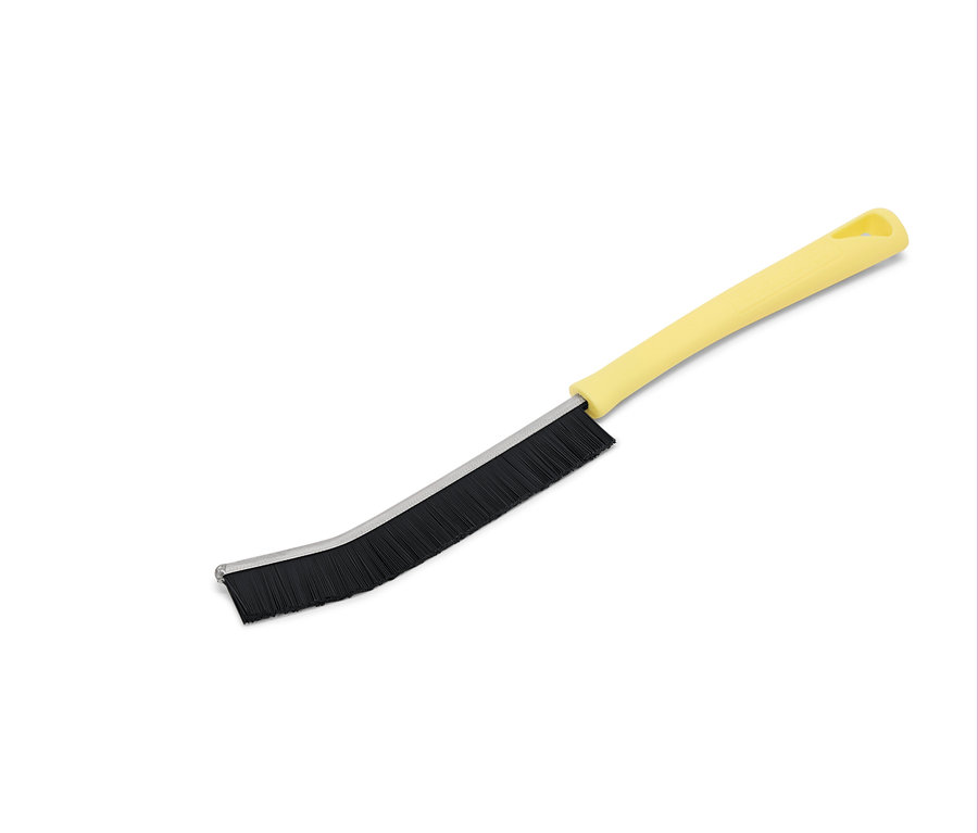 Žlutý kartáč s černými štětinami na bílém pozadí.