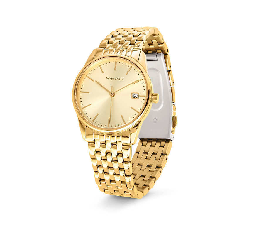 Detailní záběr na zlaté dámské hodinky.