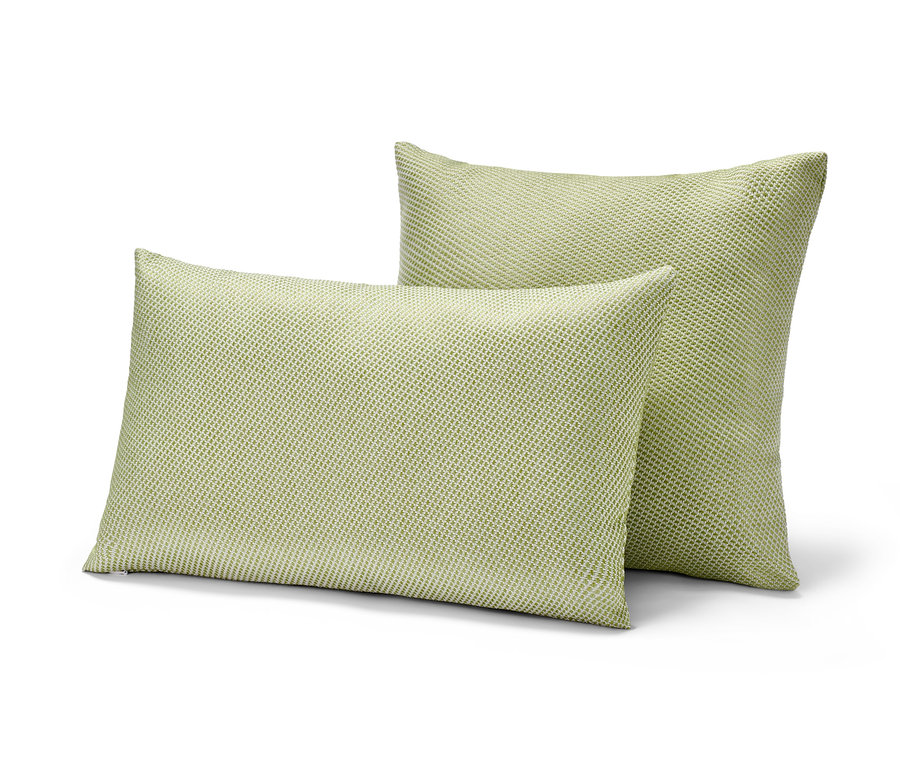 Dva venkovní polštářky světle zelené barvy.