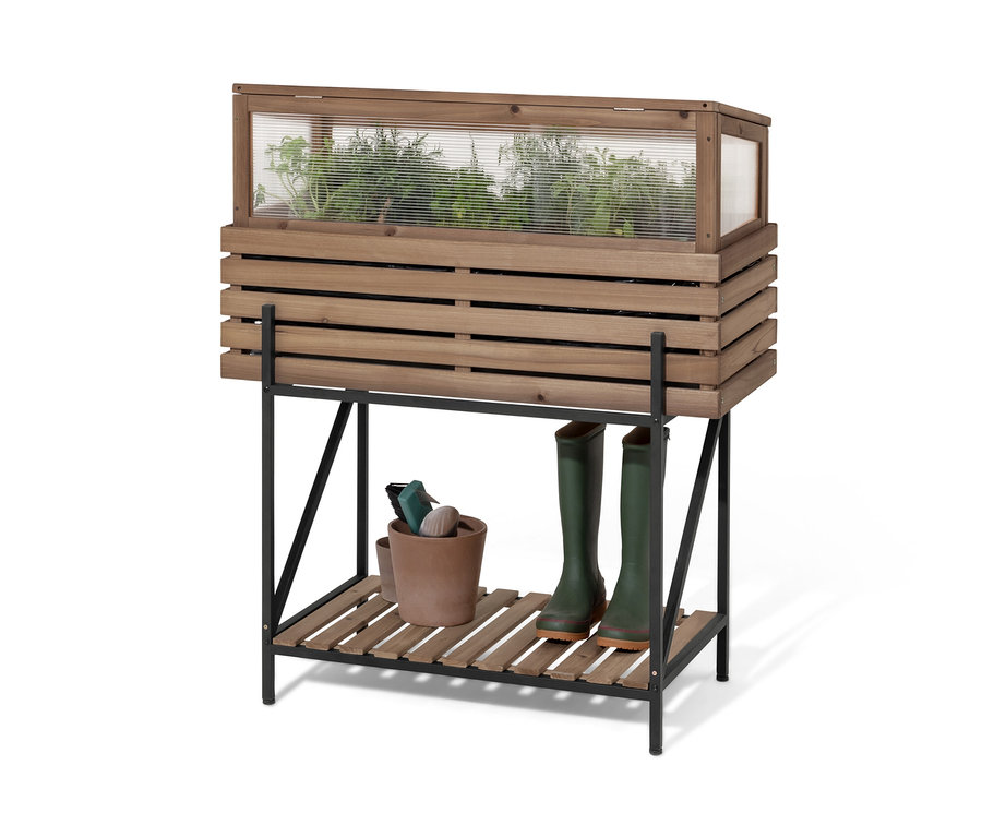 Vyvýšený truhlík se skleníkovým nástavcem »Elin« s rostlinami, květináčem a holínkami.