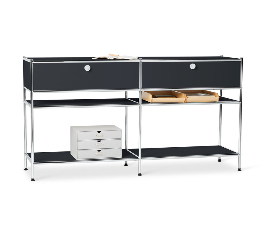 Černý kovový konzolový stolek »CN3« se 2 zásuvkami a knihou nahoře.