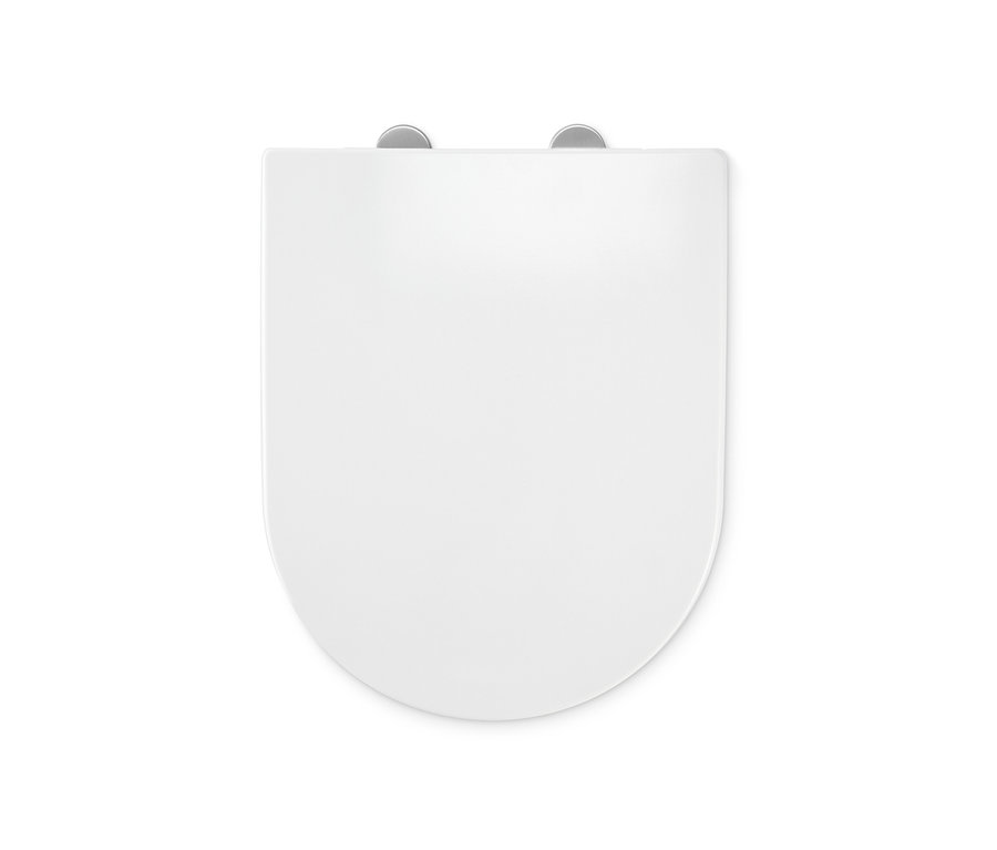 Detailní pohled shora na bílé prémiové WC sedátko s automatickým zavíráním.