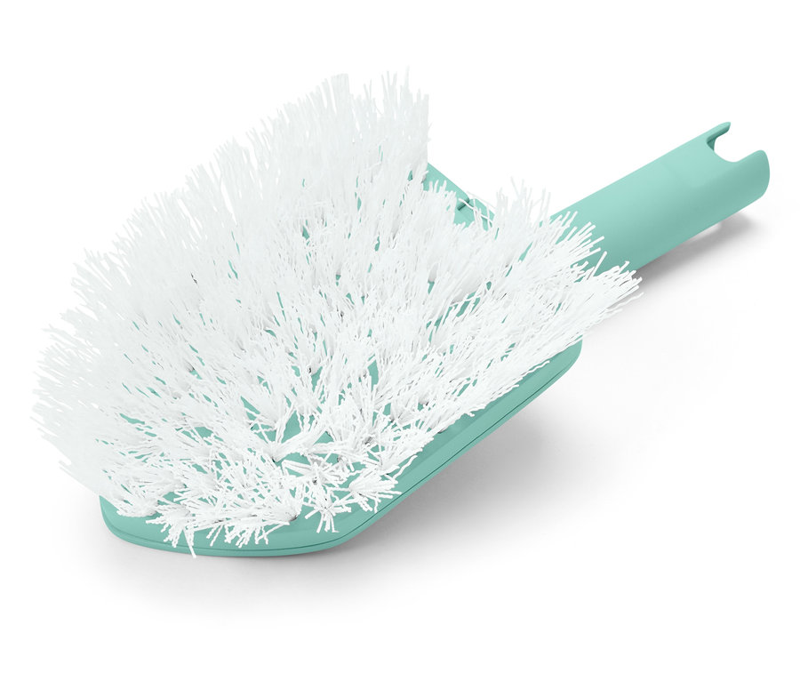 Detailní záběr bílého kartáče s modrozelenou rukojetí.