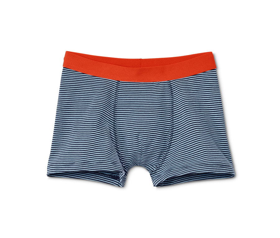 Modré chlapecké boxerky, 7 ks, s oranžovým pasem.