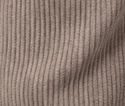 Detail teplákových kalhot.