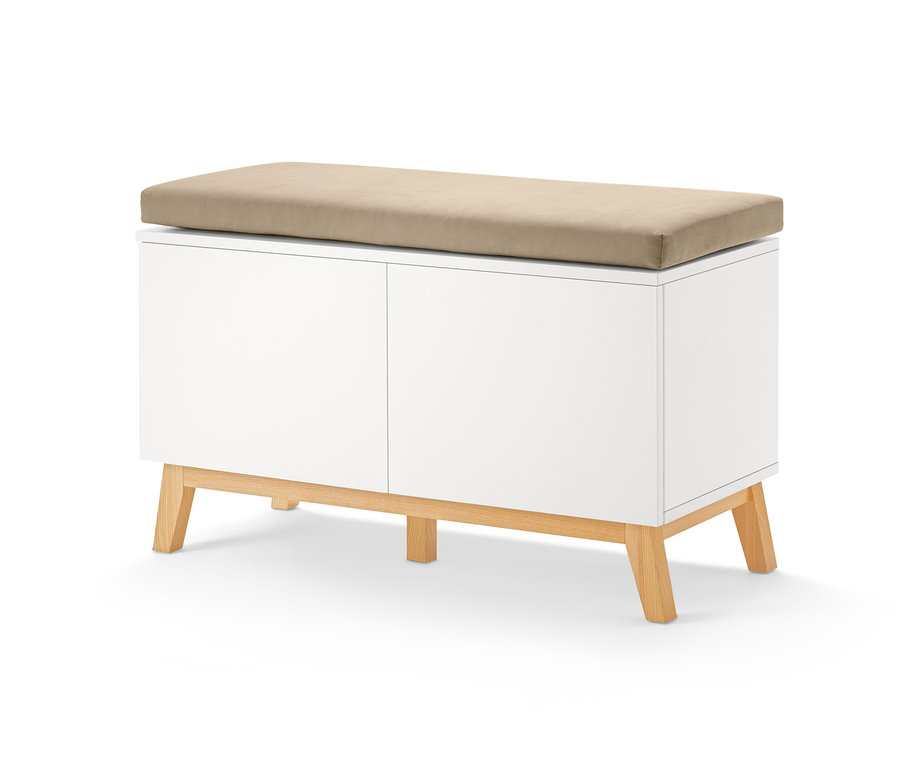 Bílá lavice na sezení s úložným prostorem a béžovým polštářem nahoře.