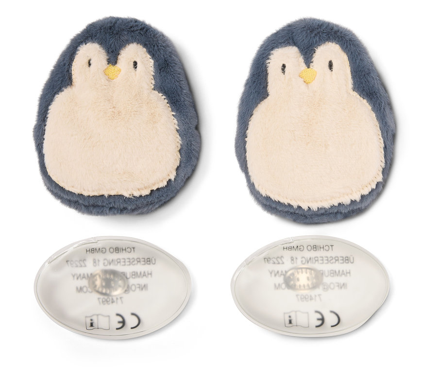 Dva páry hřejivých polštářků ve tvaru tučňáků na bílém pozadí.