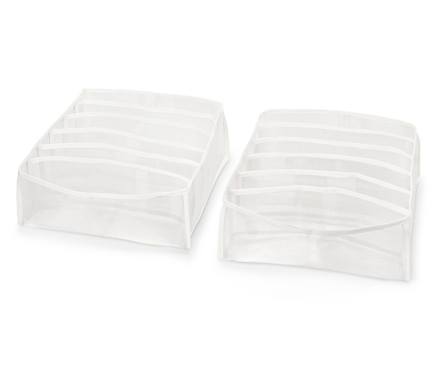 Dva bílé organizéry zásuvek s přihrádkami na bílém pozadí.