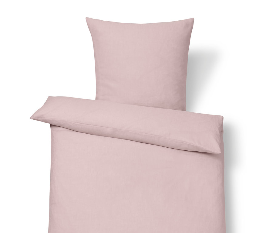Růžové lněné povlečení standardní velikosti.