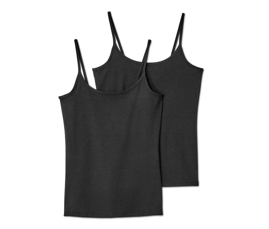 Dvě černé košilky se špagetovými ramínky, 2 ks, leží na sobě.