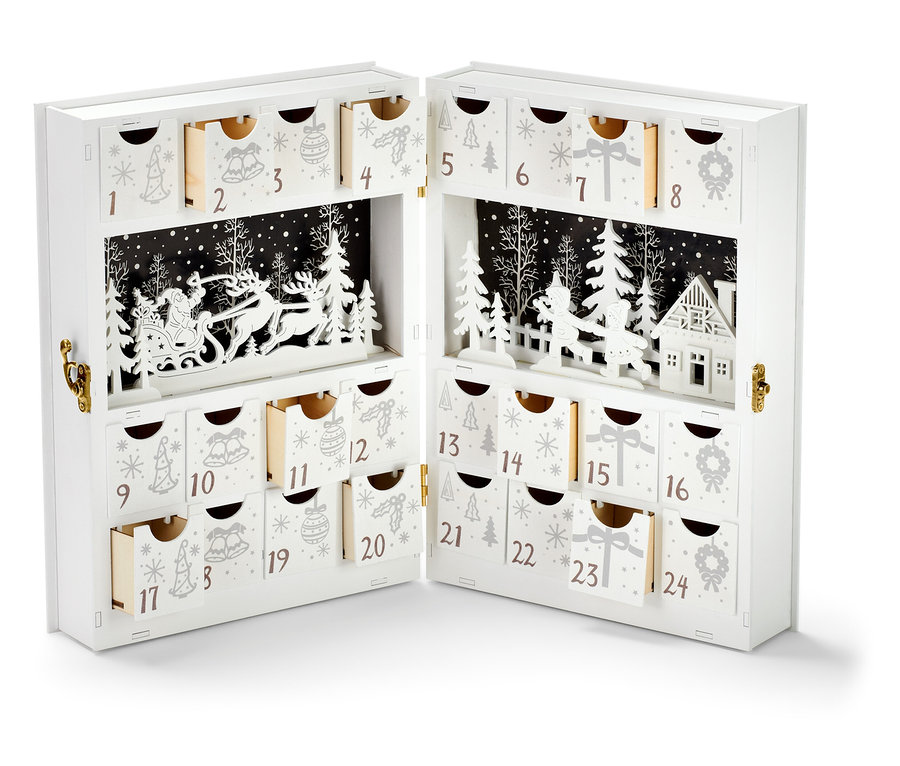Otevřený bílý adventní kalendář s LED světly a motivem zimní krajiny.