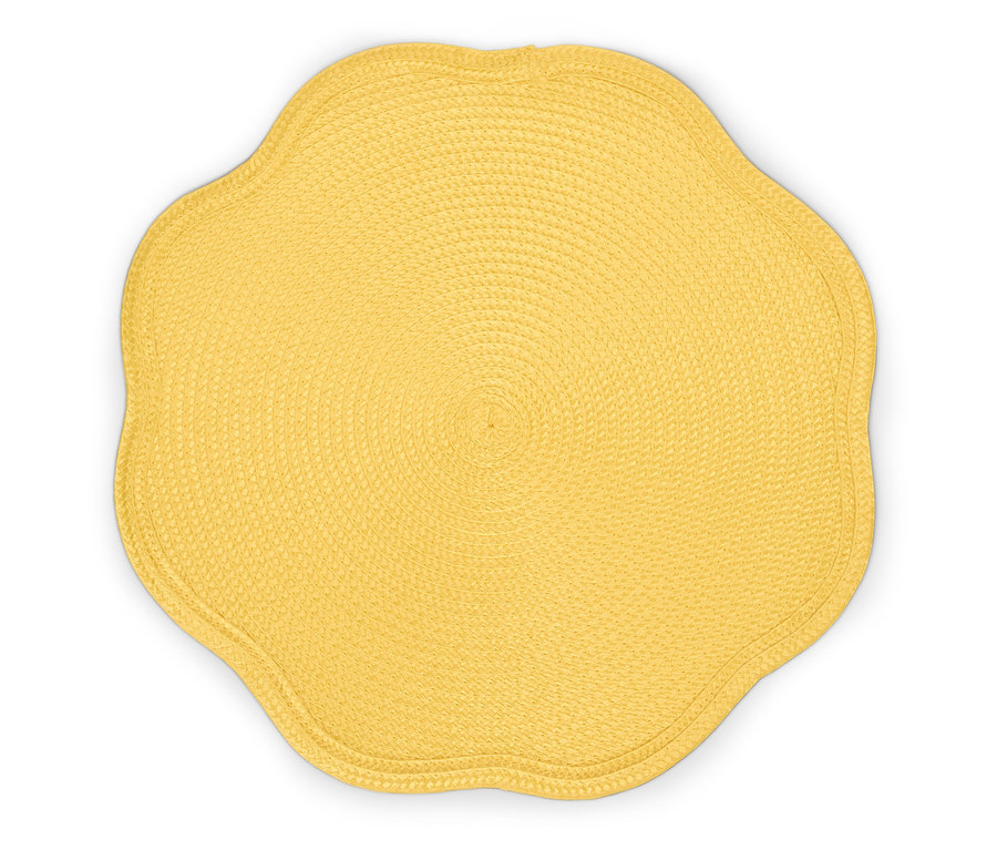 Žlutý, květinový prostírání z tkané látky.