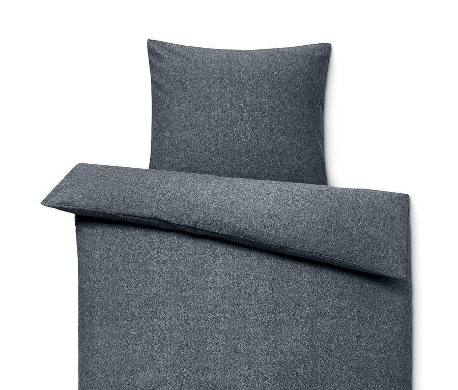 Šedé pololněné povlečení standardní velikosti s polštářem.