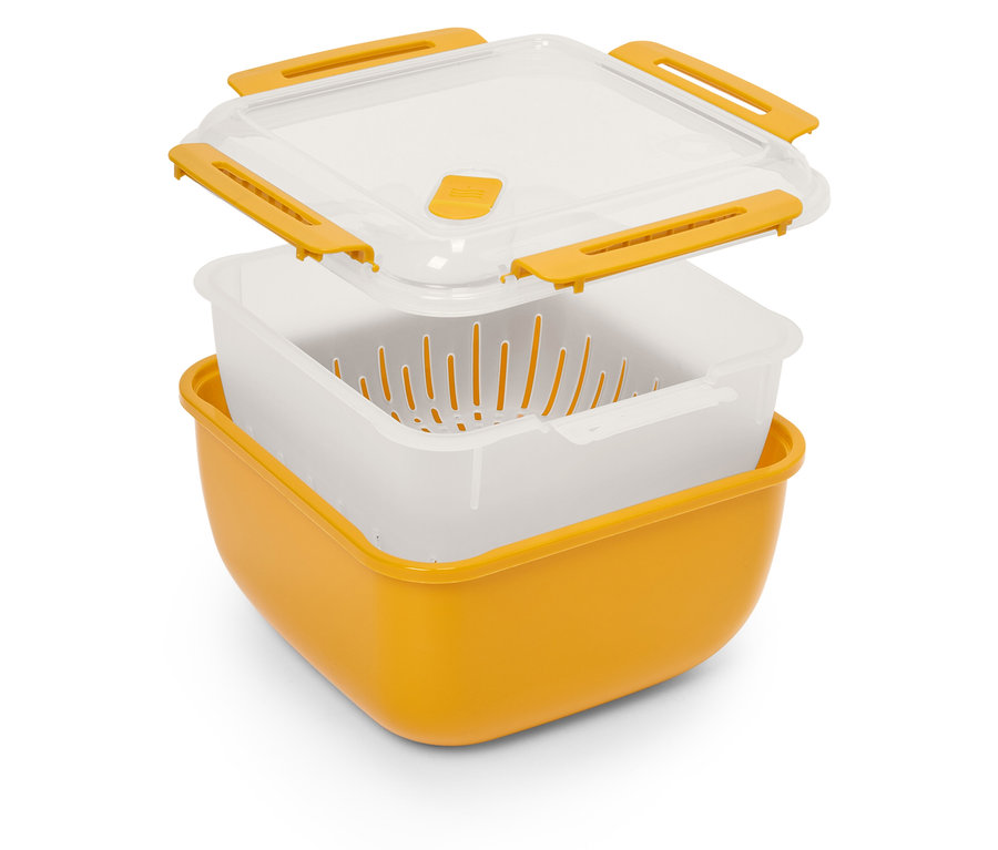 Žlutá kuchyňská nádoba se sítkem a průhledným víkem. 
