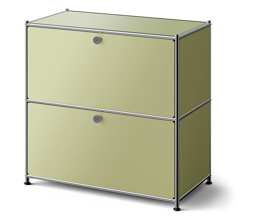 Zelená skříňka se dvěma zásuvkami a stříbrným rámem.