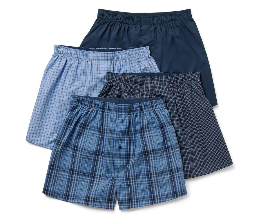 Čtyři pánské trenýrky různých barev a vzorů.