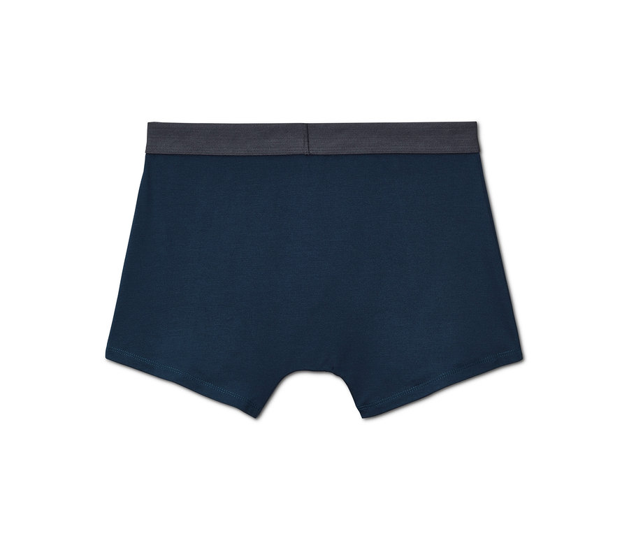 Detailní záběr na modré pánské boxerky Modalové, 2 ks, s šedým pasem.