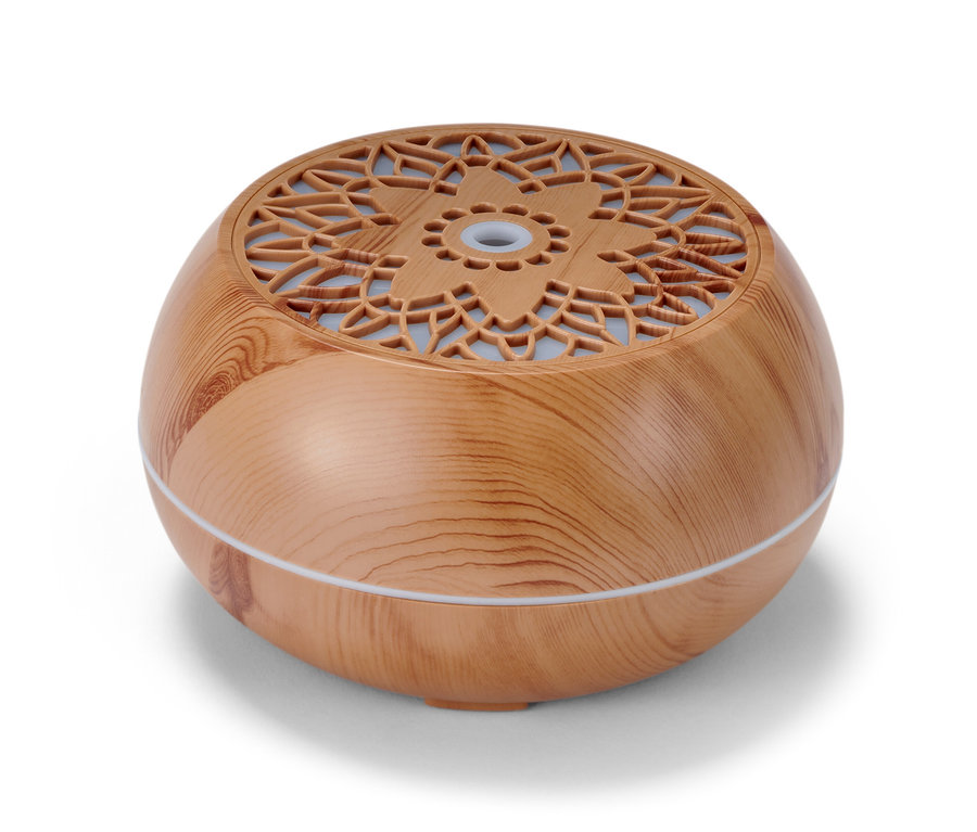 Detailní pohled na hnědý aroma difuzér s Bluetooth® reproduktorem.