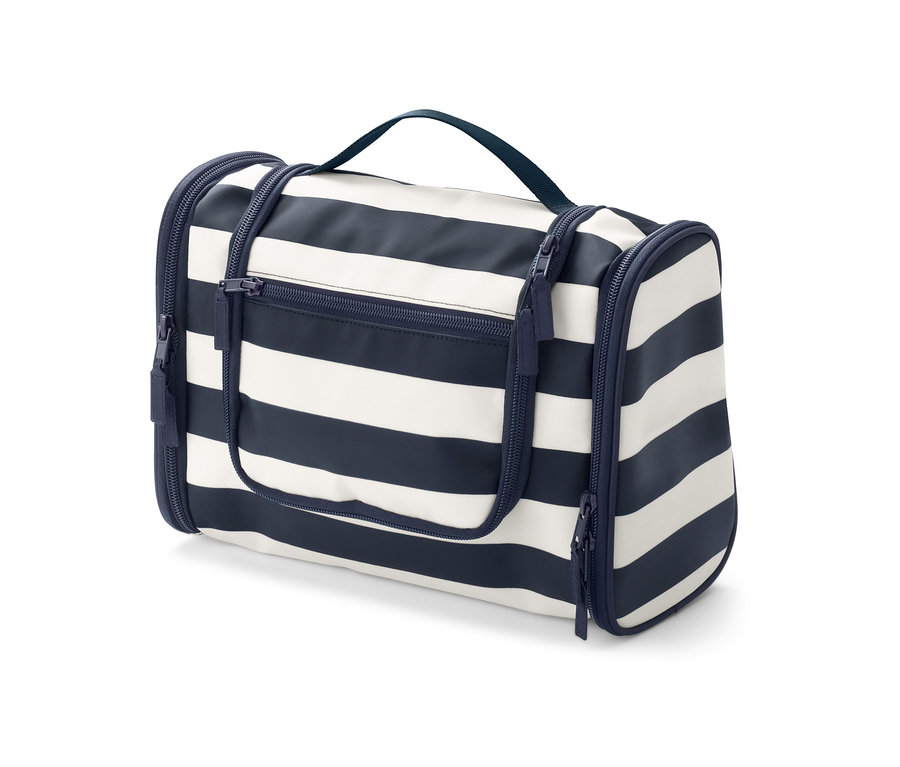 Pruhovaná toaletní taštička s uchem a zipy.