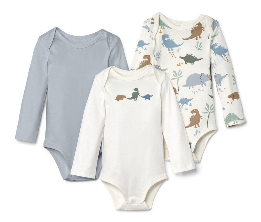 Tři body s dlouhým rukávem: šedé, bílé s dinosaury a bílé s potiskem dinosaurů.