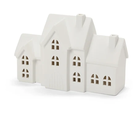 Dekorativní bílý porcelánový domeček se čtyřmi okny a komínem.