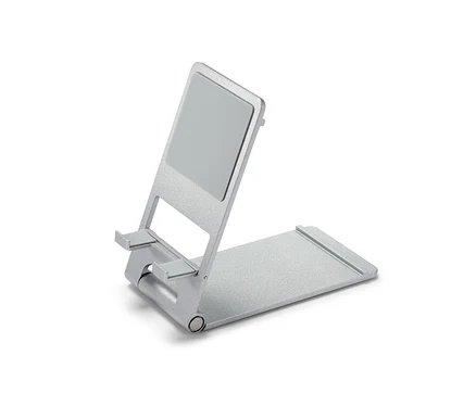 Stříbrný stojan na smartphone a tablet.