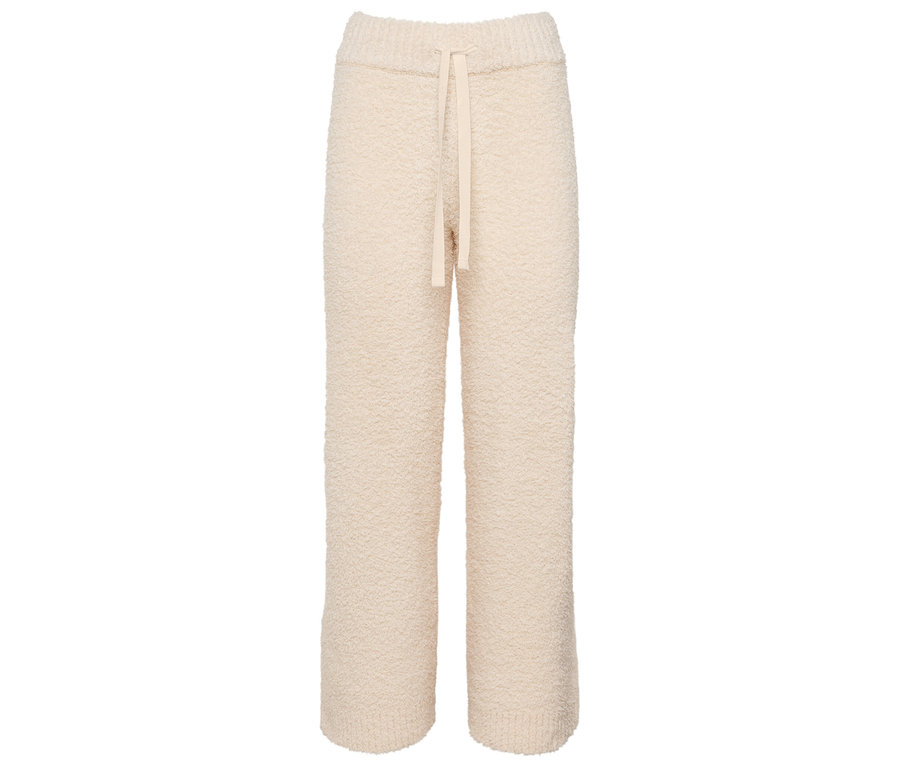 Krémové pletené kalhoty se stahovací šňůrkou.