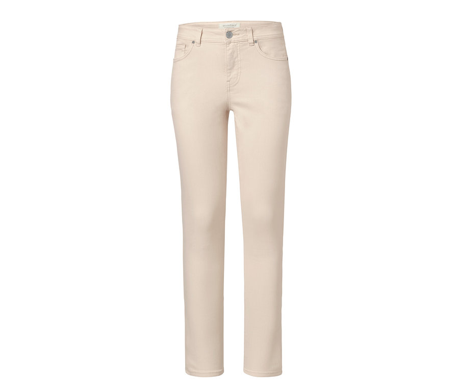 Béžové přiléhavé džíny na bílém pozadí.