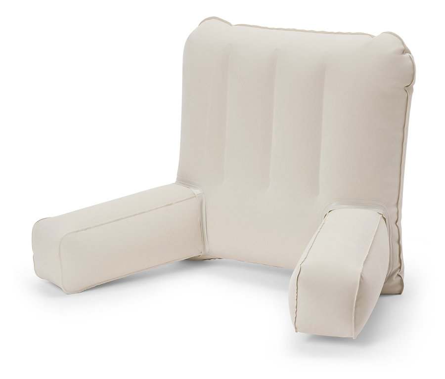 Béžový polštář s područkami na opření zad.