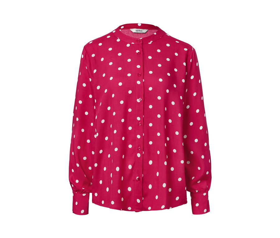 Detail puntíkované tkané halenky.